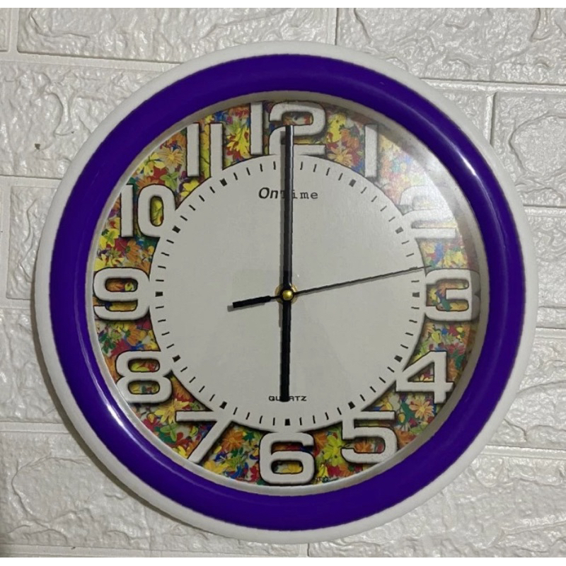 Jam dinding Bulat Corak Bunga Ontime 767
