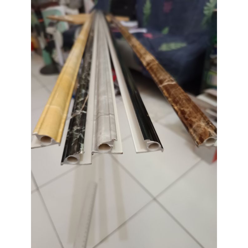 Kuku Macan PVC Tile Trim