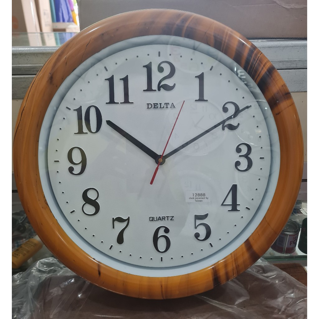 jam dinding delta / jam dinding motif kayu / jam dinding jumbo / jam dinding awet / jam dinding maka