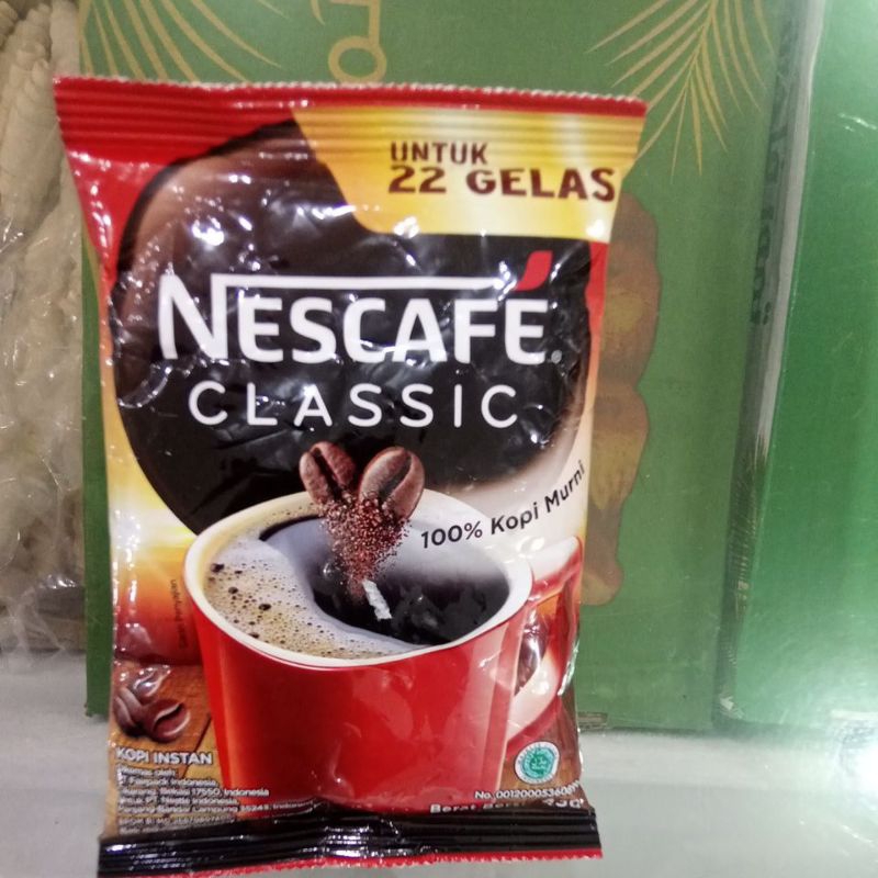

COFFE NESCAFE CLASSIC 100% UNTUK 22 GELAS BERAT BERSIH 45 GR