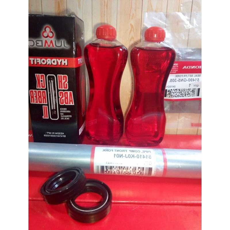 ￼PAKET 1 AS SHOCK DEPAN KOJ + 2 SEAL SHOCK DEPAN HONDA + 2 OLI SHOCK MEREK JUMBO.BEAT DELUXE GENIO B