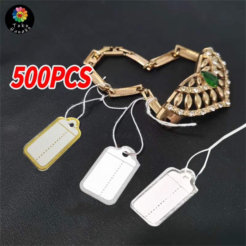 

Isi 500 Label Harga Perhiasan Tali Gantung Gold/Silver Kertas Tulis Premium Cocok Toko Emas & Aksesoris
