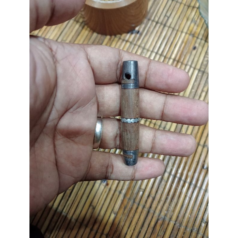 liontin kayu bungkang