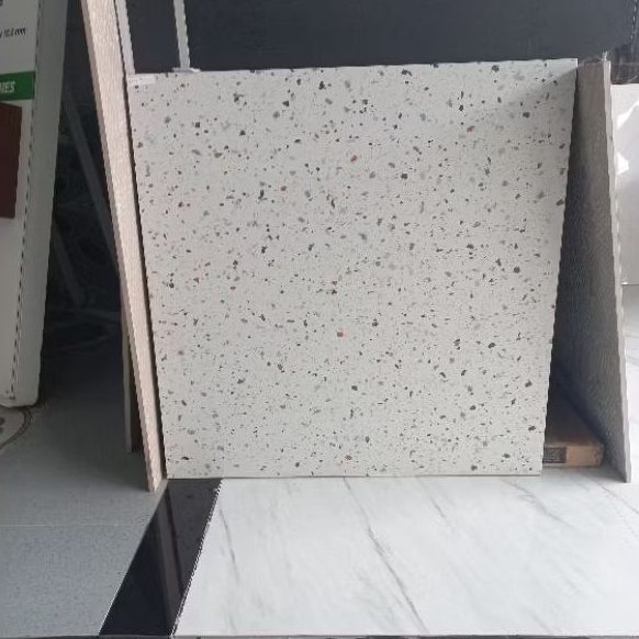GRANIT MERK IKAD TIPE CANDY TERRAZZO WARNA LATAR PUTIH UKURAN 60X60 PERMUKAAN TEKSTURE MATT