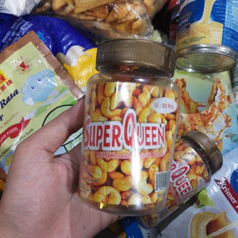 

Super queen milk chocolate with nuth toples isi 50pcs