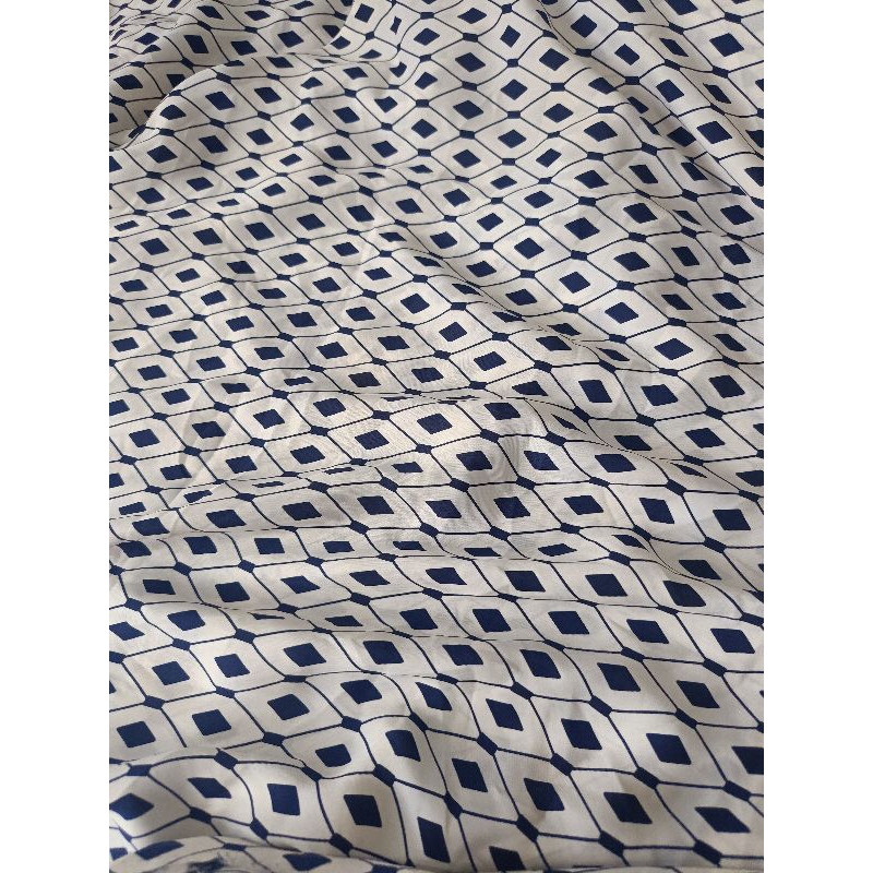 kain silk satin motif abstrak