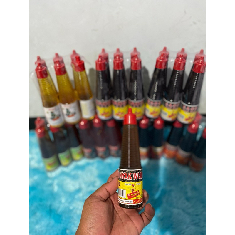 

Minyak wijen 150ml cap Bunga Rosella