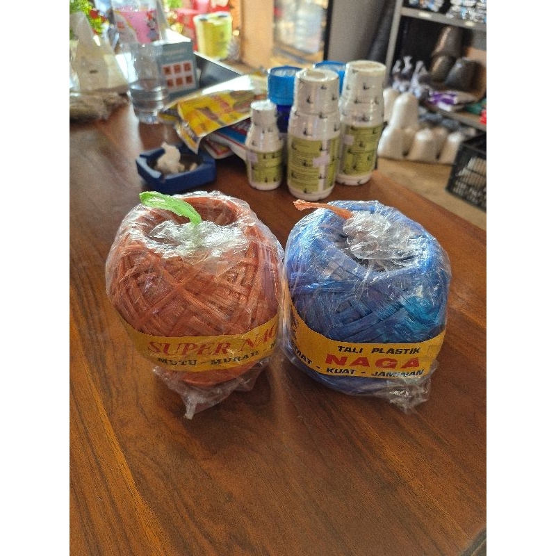 

Tali Plastik Rafia cap NAGA 75gr bening/tali kuat WARNA RANDOM