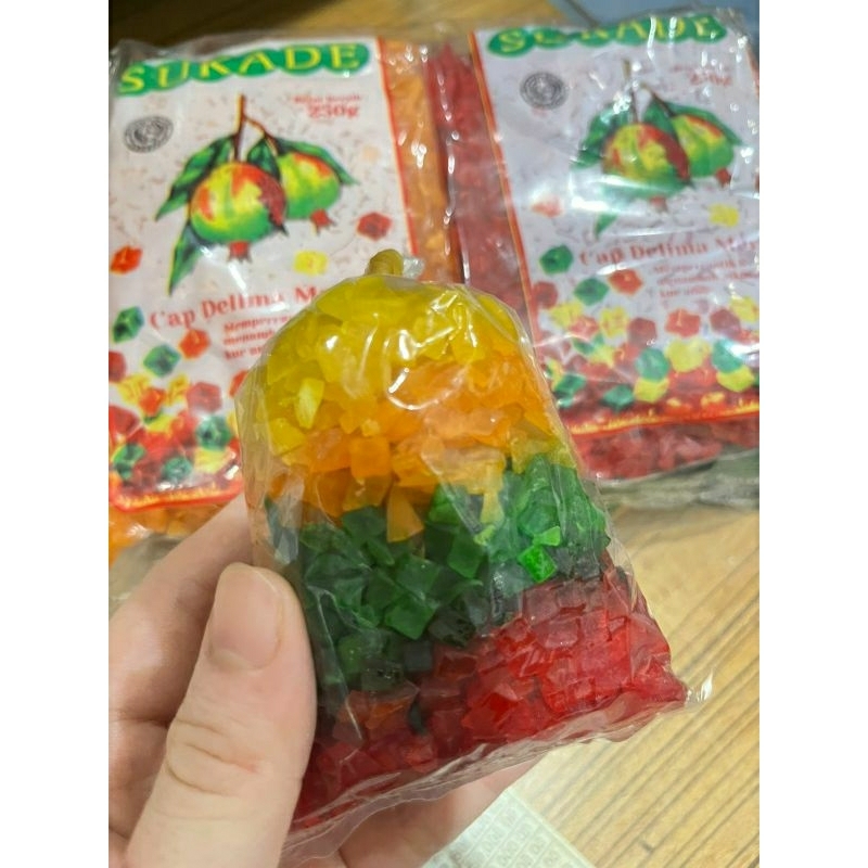 

Sukade cap delima merah 100gr (campur warna) / Sukade warna warni / Sukade buah kering / Sukade apple mix / Sukade premium
