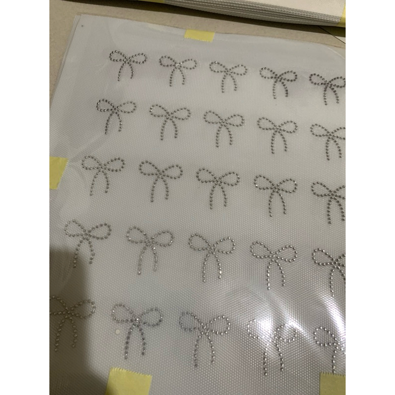 payet mote gosok press tempel motif pita