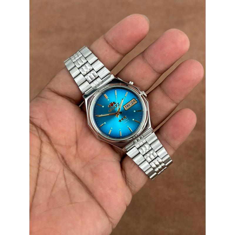 JAM TANGAN PRIA ORIENT THREE STAR CRYSTAL BLUE DIAL DAY DATE JAPAN