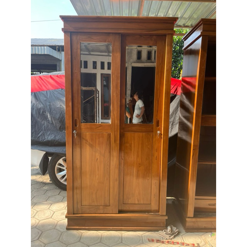 Lemari pakaian minimalis 2 pintu kayu jati Lemari pakaian minimalis 2 pintu sliding kayu jati asli
