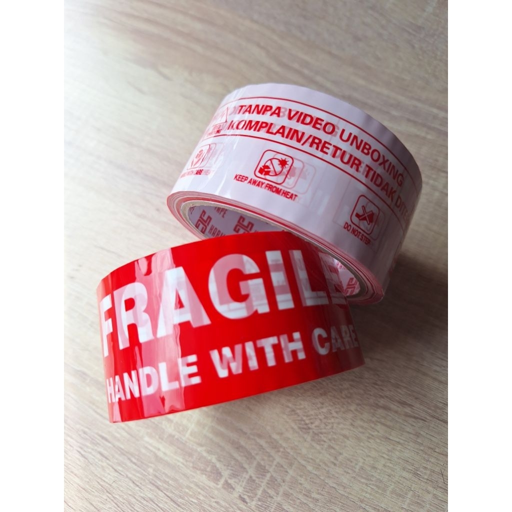 

LAKBAN FRAGILE AWAS PECAH BELAH ASLI READY STOK TERBATAS ECERAN MURAH PENANDA LABEL PENGIRIMAN UNIK