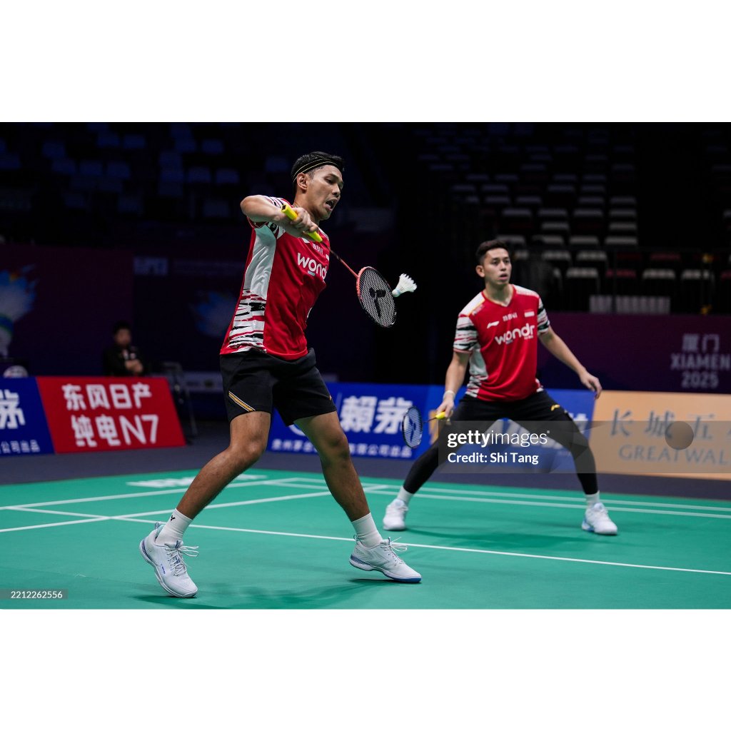 baju badminton premium bulutangkis Fajar Alfian (L) and Muhammad Rian Ardianto of Indonesia