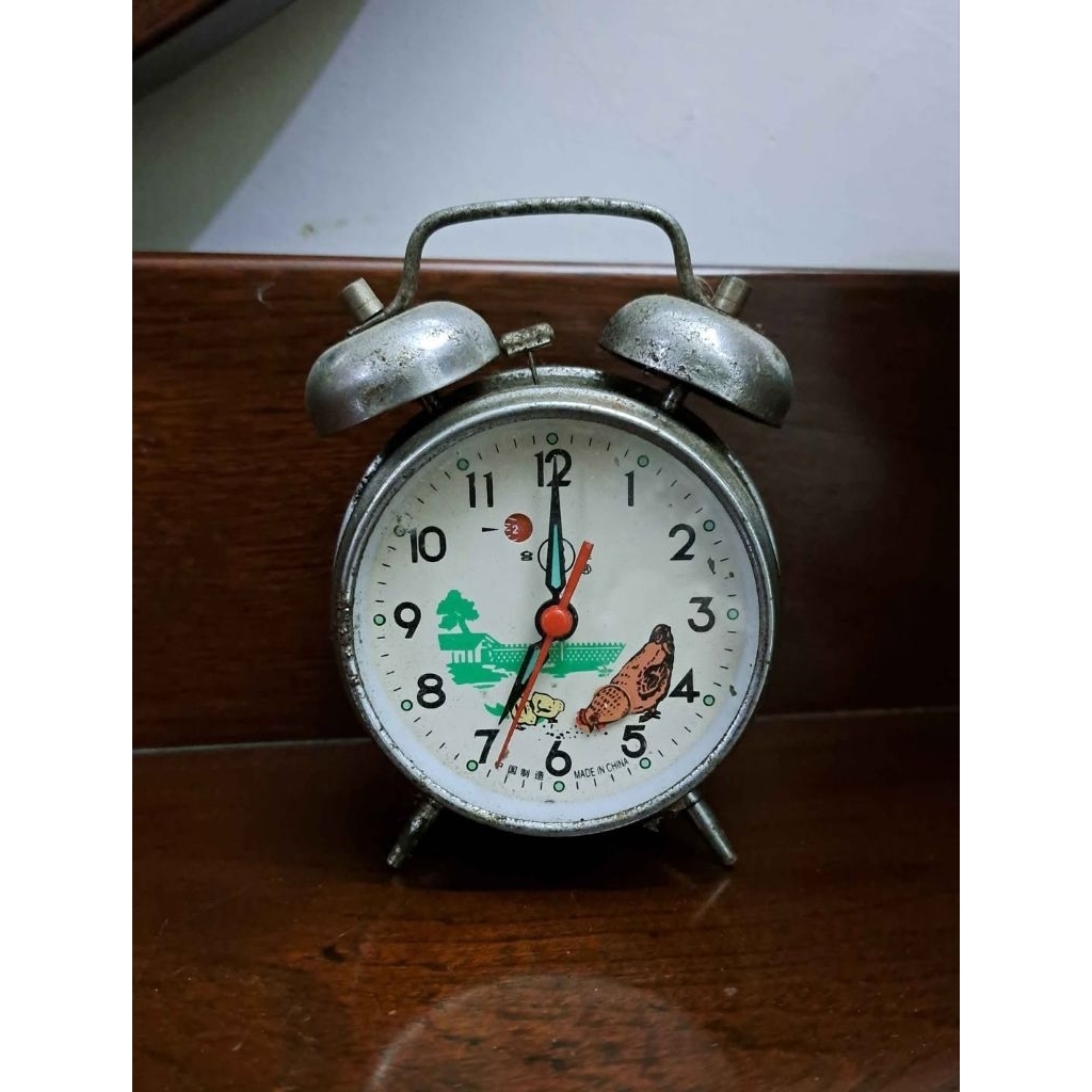 Jam Beker "Ayam Nyucuk".