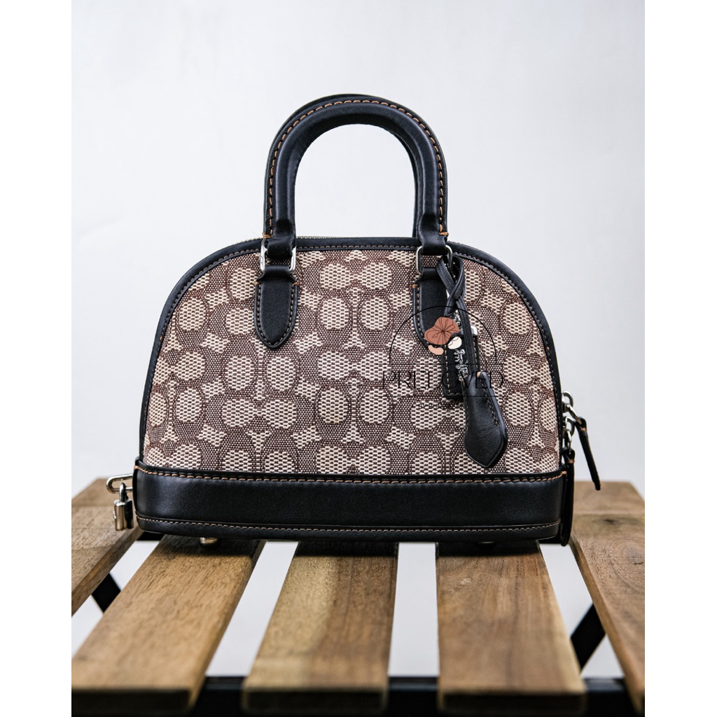 PRELOVED COACH REVEL BAG IN SIGNATURE TEXTILE JACQUARD