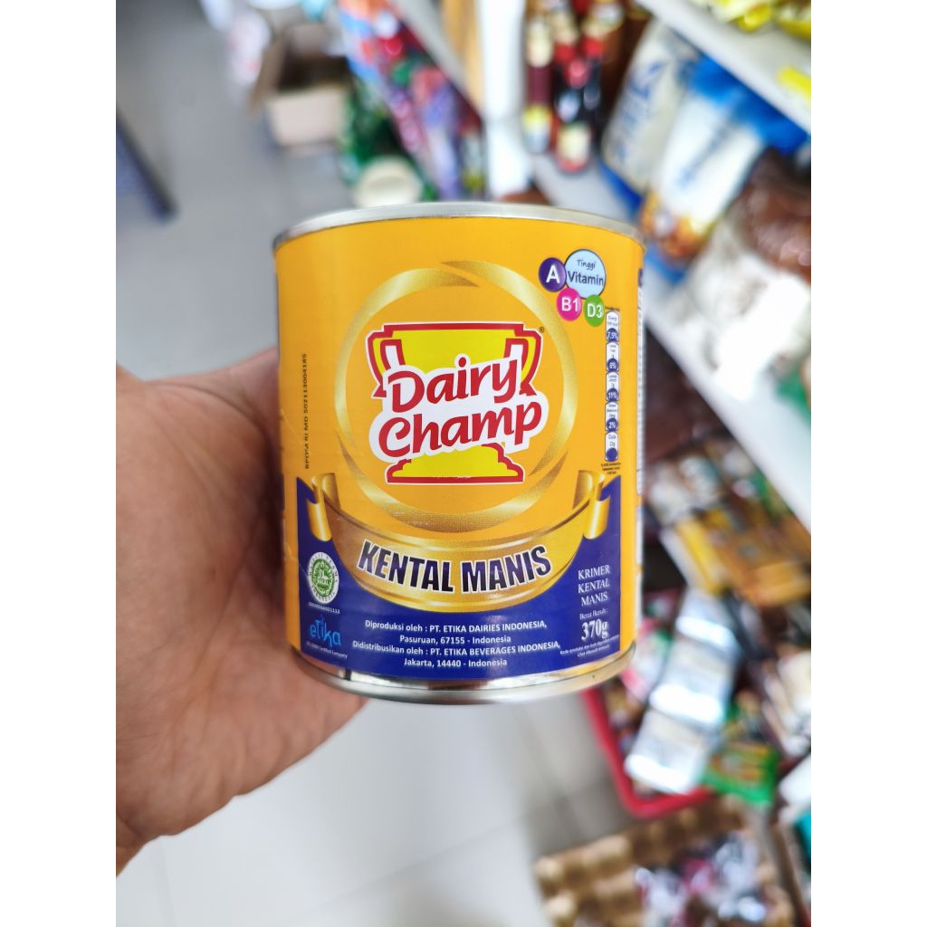 

Dairy Champ 370 g Susu kental Manis