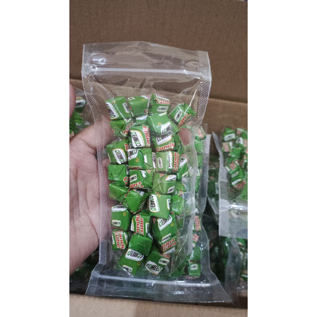 

Permen coklat comelo candy cube isi 50 pcs