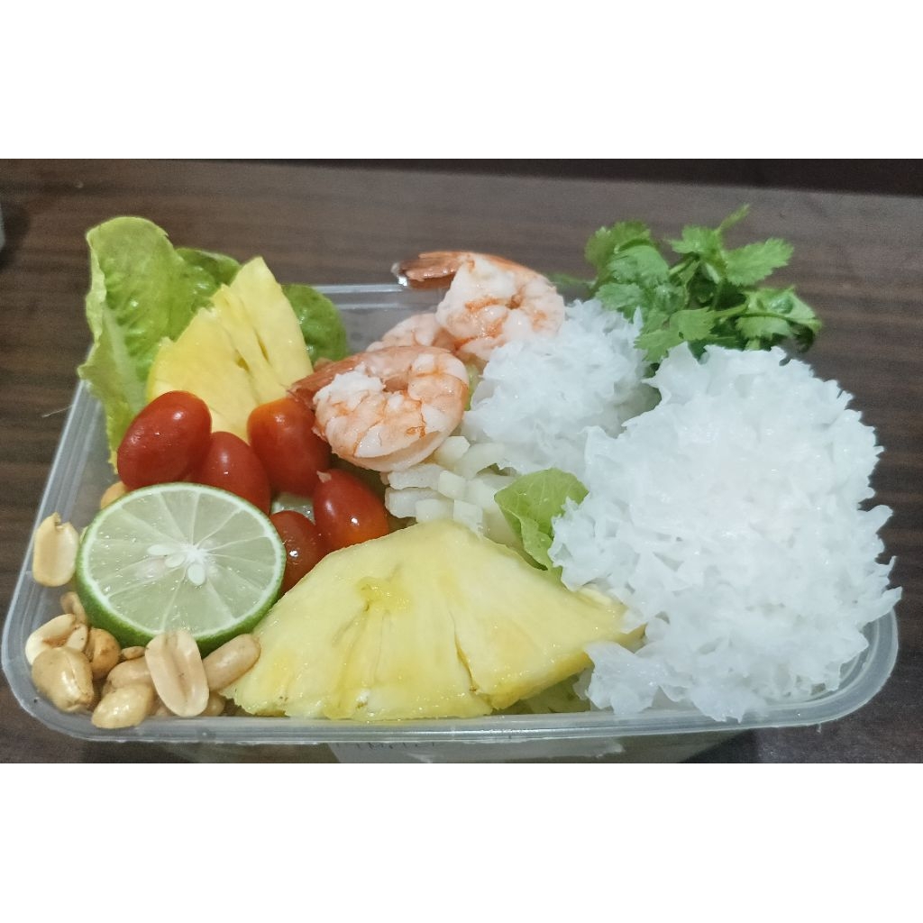 

Somtam Salad Thailand dengan Jamur Salju.