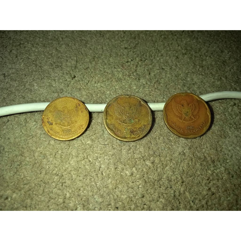 uang koin kuningan (100rp karapan sapi 1995, 500rp melati 1991&1992)