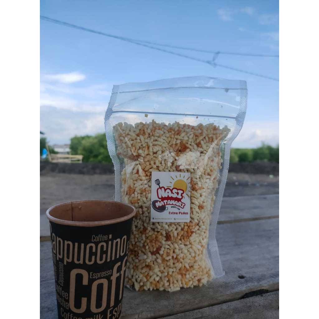 

Nasi Matahari Khas Madura, Cemilan khas orang madura yang terkenal akan kelezatan makanannya.