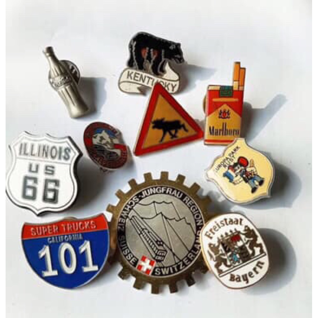 Vintage Europe Enamel Pin and plastic   Copyrigt 1970s 1980s  Lot consisting of a few metal and enam