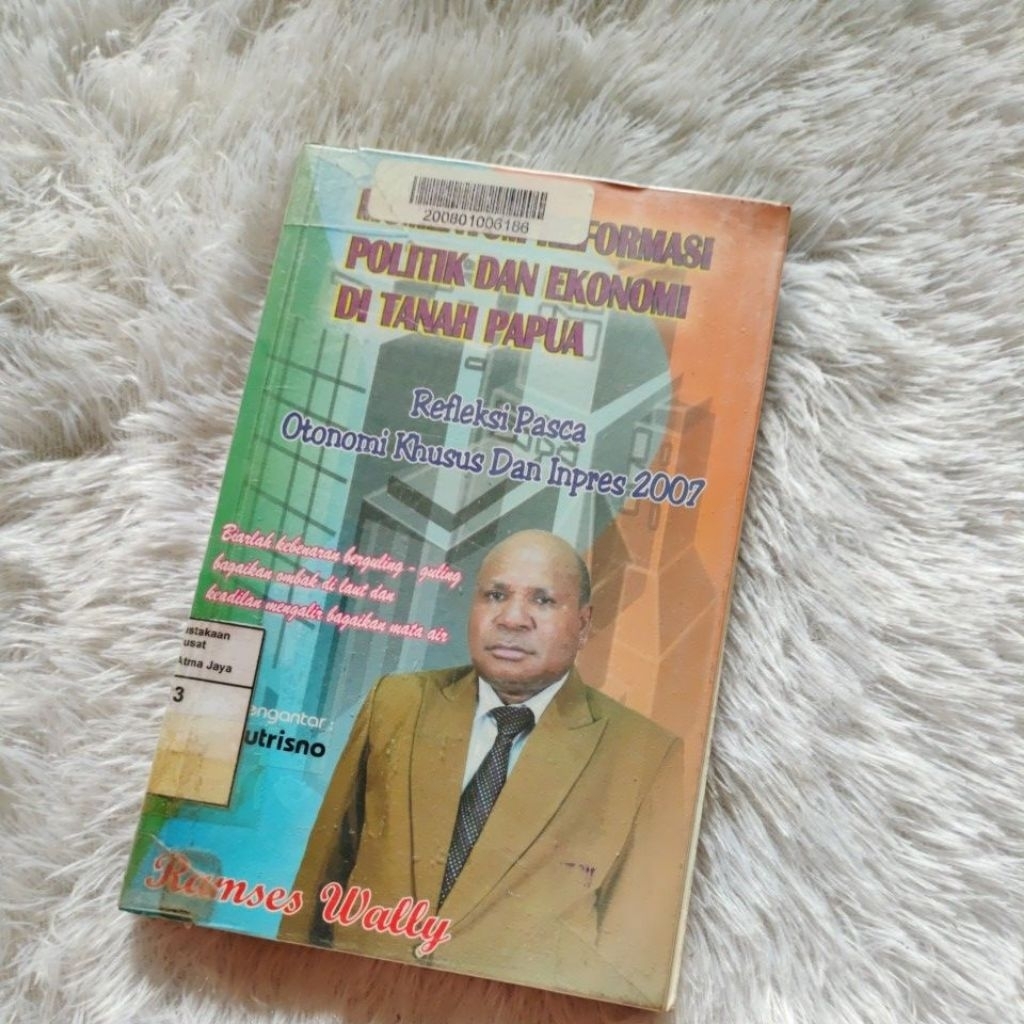 MOMENTUM REFORMASI POLITIK DAN EKONOMI DI TANAH PAPUA - RAMSES WALLY