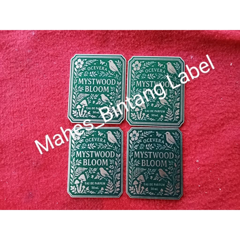 

Label plate custom untuk parfum.