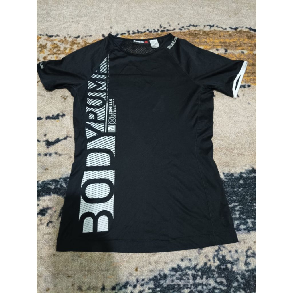 Kaos sport wanita Reebok les Mills body pump