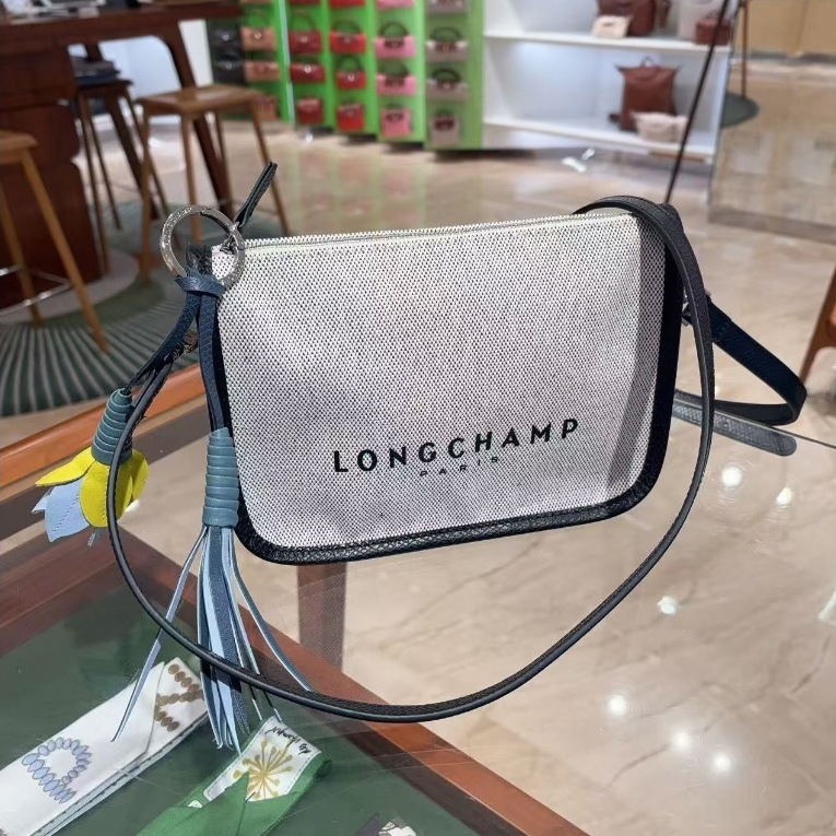 2025 Long Champ Paket Pos Rumput Tenun Tas Musim Panas Pantai Wander hobo tas kulit tas baru tas tan
