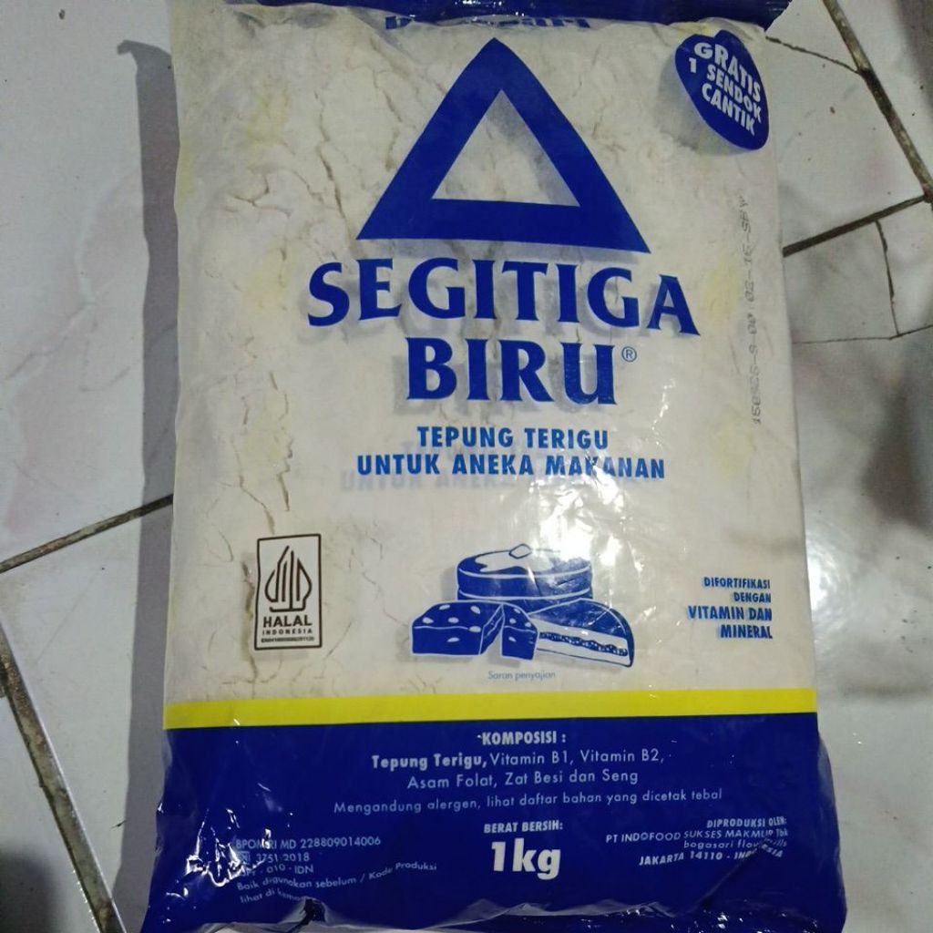 

tepung terigu kemasan 1kg..tulip.segitiga biru.lencana merah