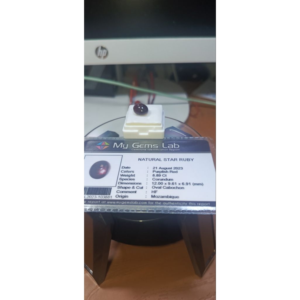 Natural star ruby with memo