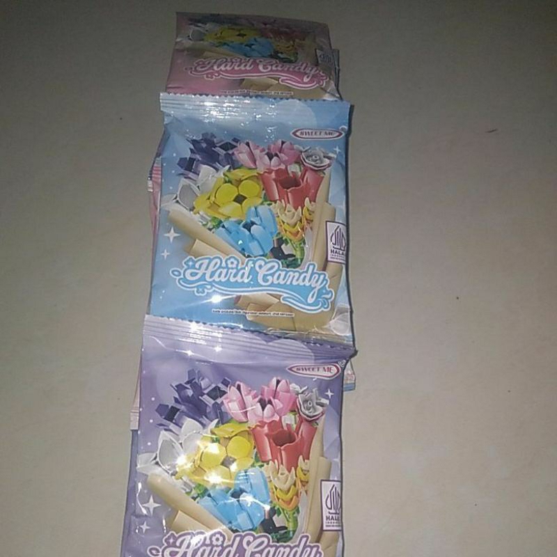 

Hard Candy bentuk bunga 1renteng isi 10ps