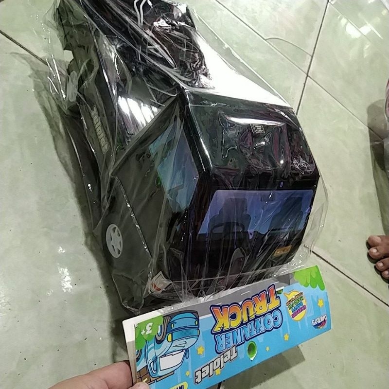 mobil pick up pakai batere dan ada tali nya
