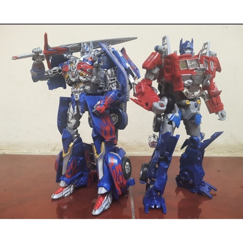 Optimus Prime AOE dan TLK