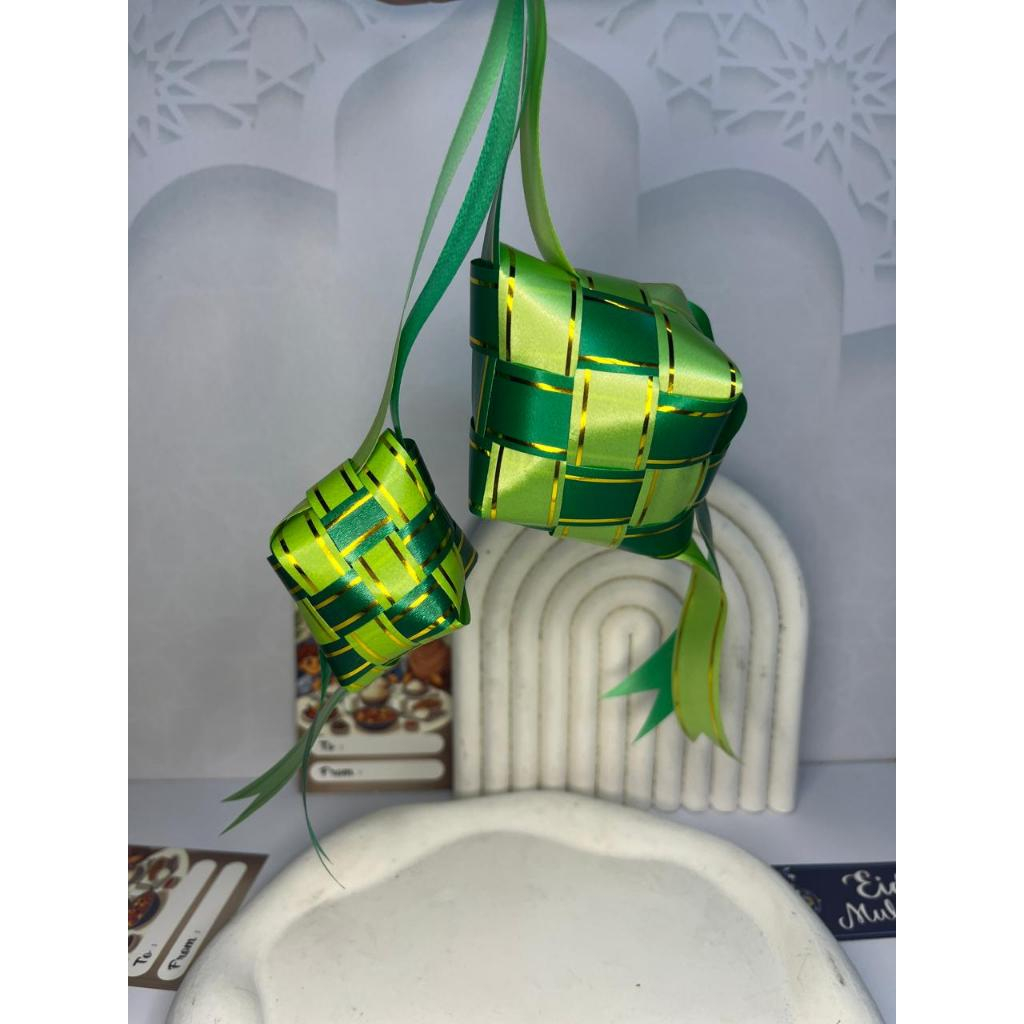 

KETUPAT PITA HIAS LEBARAN / KETUPAT PITA LISMAS / KETUPAT IDUL FITRI HIASAN HAMPERS MURAH BERKUALITAS