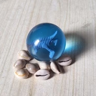 Mainan anak bola bekel biji kerang