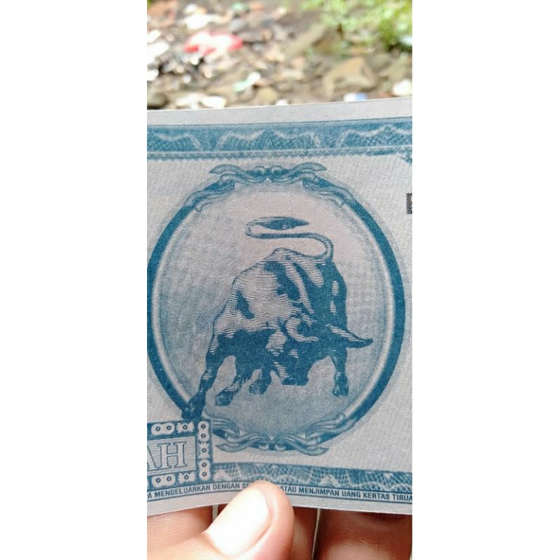 Koleksi Uang Souvenir nominal 1000 Soekarno tahun1960 warna biru gambar Banteng Nyeruduk