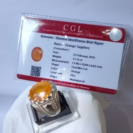 Natural orange sapphire plus memo