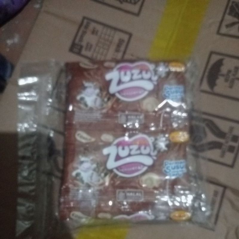 

Zuzu Permen susu rasa strobery dan coklat