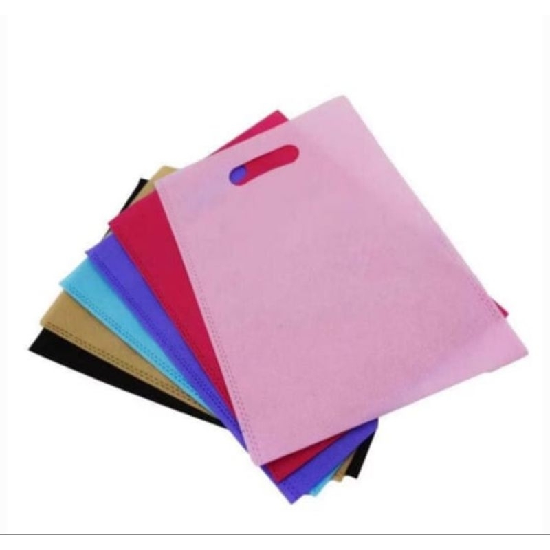 

goodie bag tas spunbond oval 25x35 TEBAL ,Tas press ,dcut ,plong