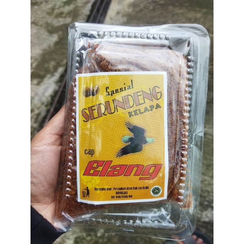 

Serundeng / Srundeng Kelapa Cap Elang Kemasan Mika 250gr Rasa Manis dan Pedas