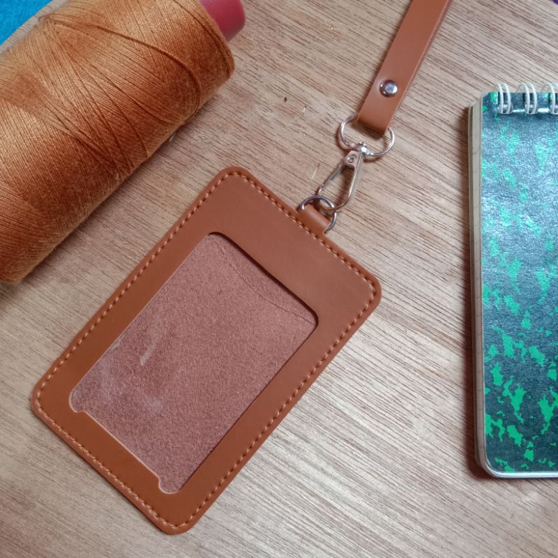 

Tempat id card ring D kulit sintetis tebal|Name tag lanyard