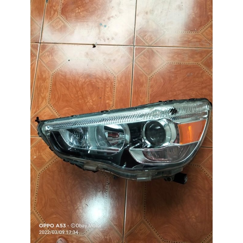 headlamp/lampu depan Outlander
