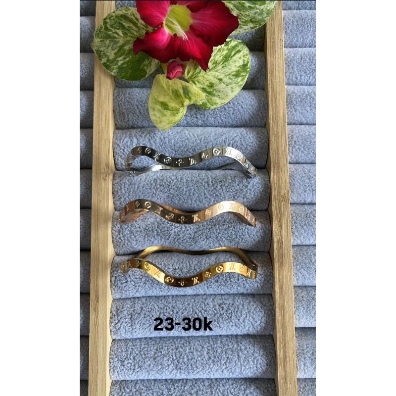 gelang cartier gelombang titanium