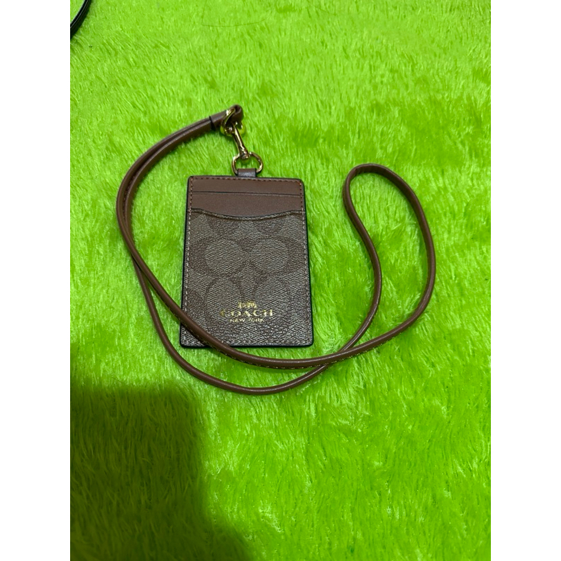 

Lanyard Coach Brown Tanrust