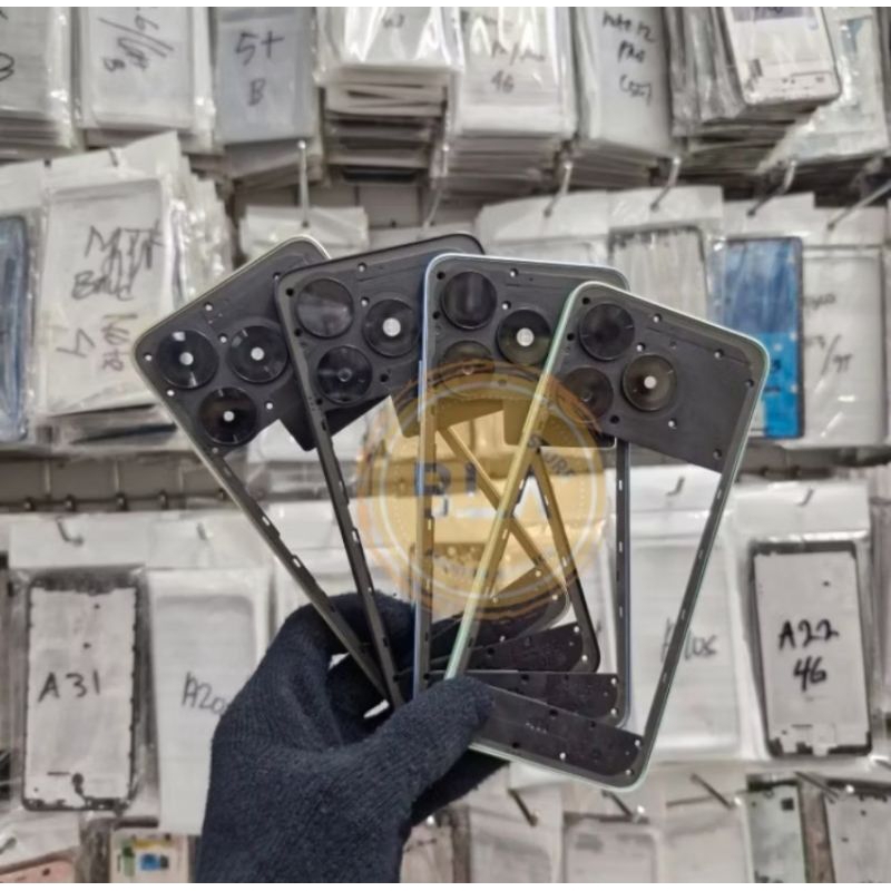 BEZEL TUTUP MESIN TULANG TENGAH BEZEL ITEL A70 / A665L