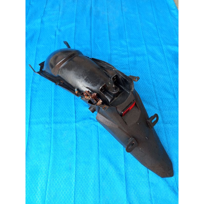 spakbor belakang MX new 135
