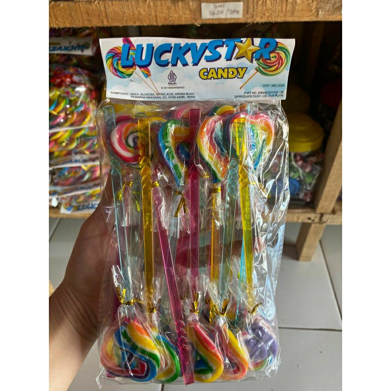 

Lolipop pita dan tuding ISI 20 pcs