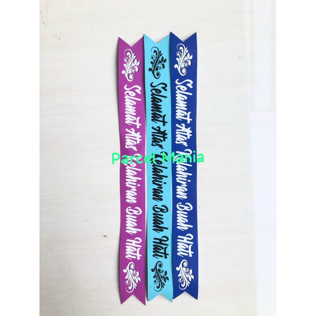 

Selempang Selamat Atas Kelahiran Buah Hati Isi 12 Pcs HK Hiasan Parcel Pita Parsel Hampers